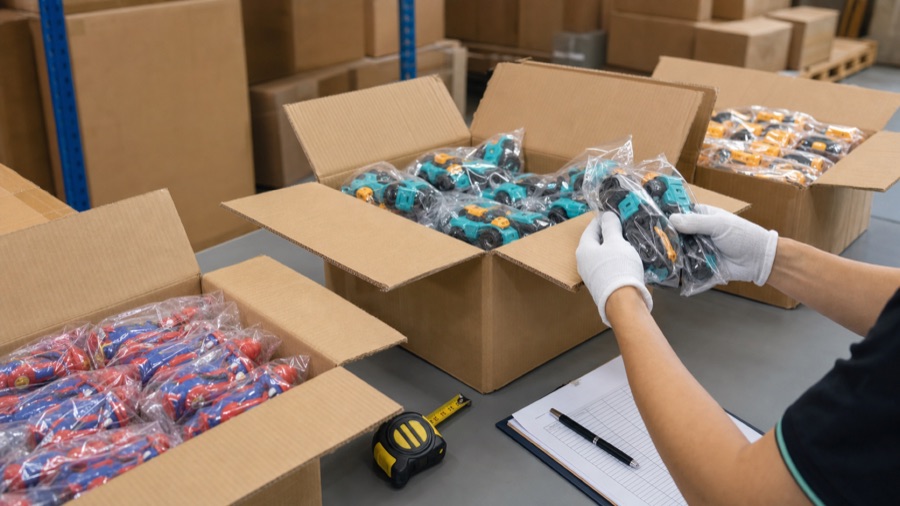 Toy quality control unboxing and quantity check with open cartons