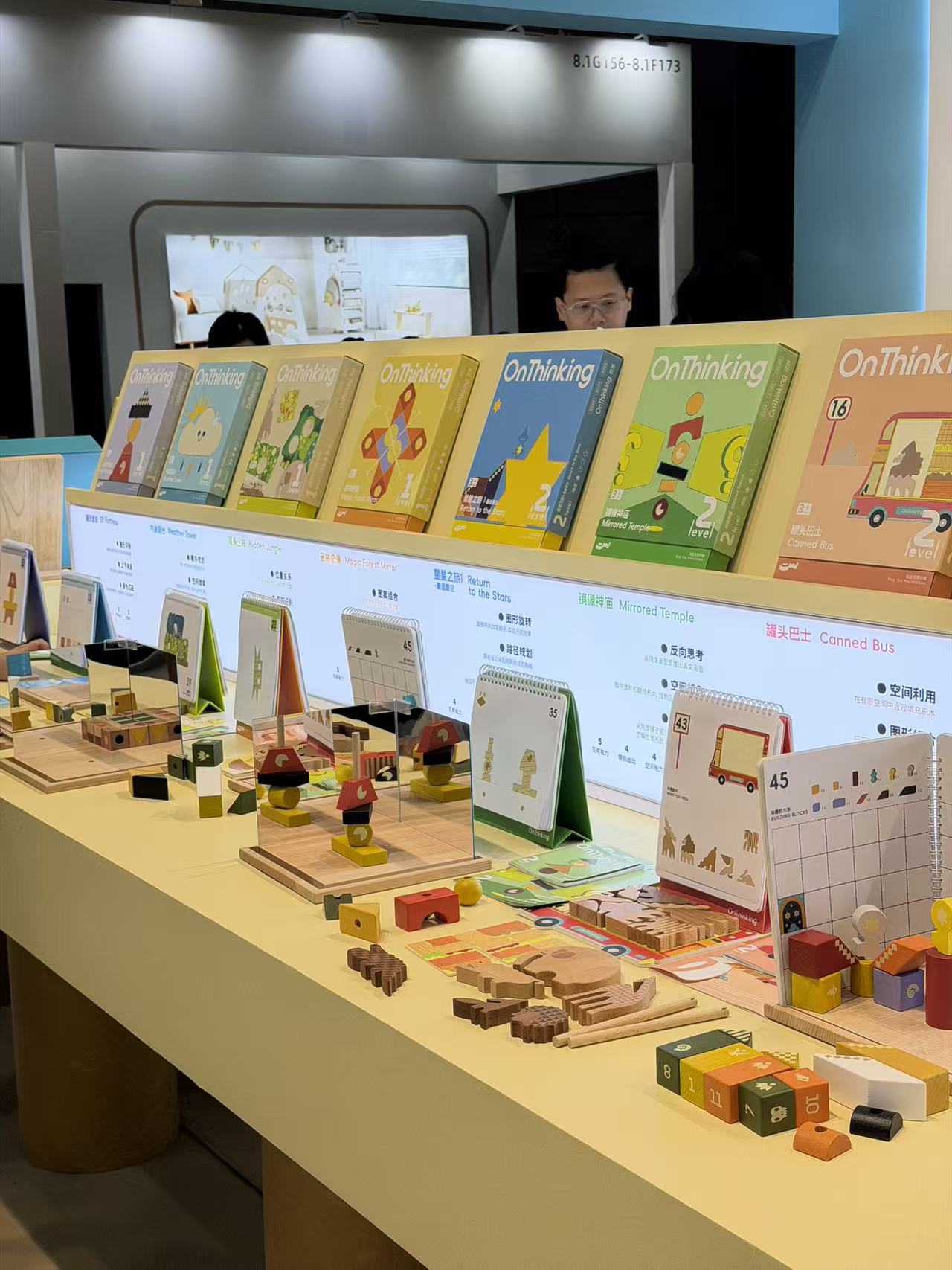 Educational wooden toys and learning materials at a supplier booth