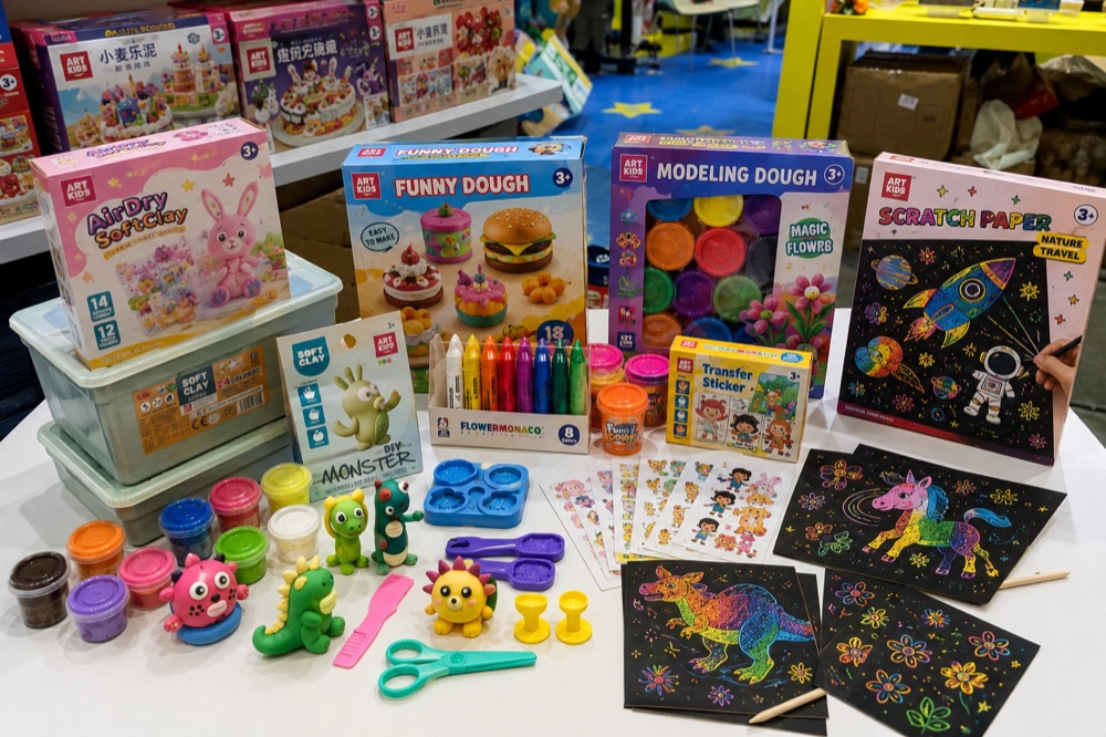 DIY craft kits, modeling dough, scratch art, and creative activity sets at a China toy fair