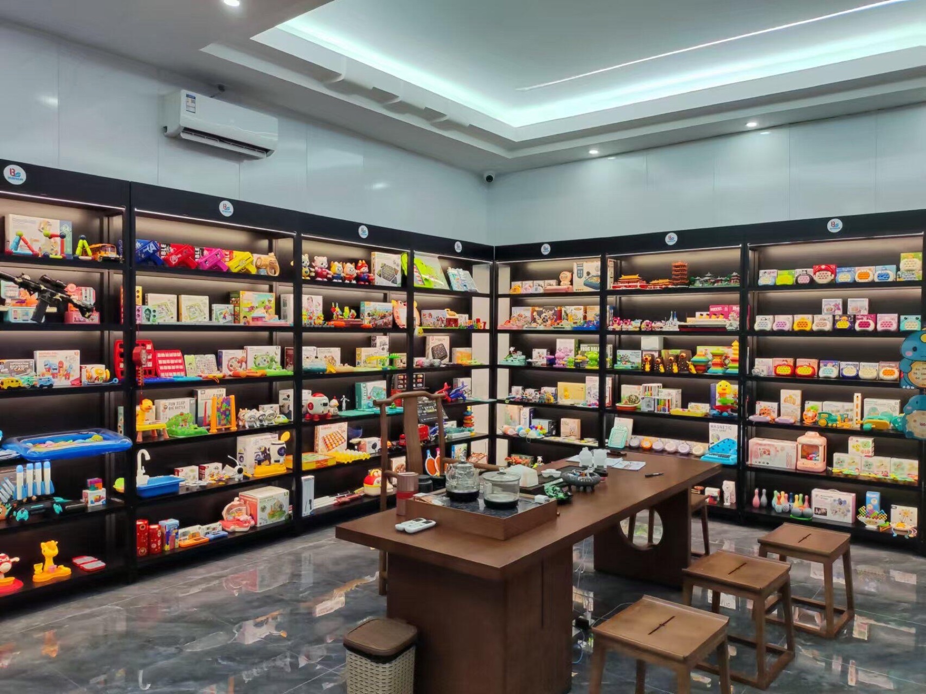 Toy showroom shelves displaying varied product categories for supplier research