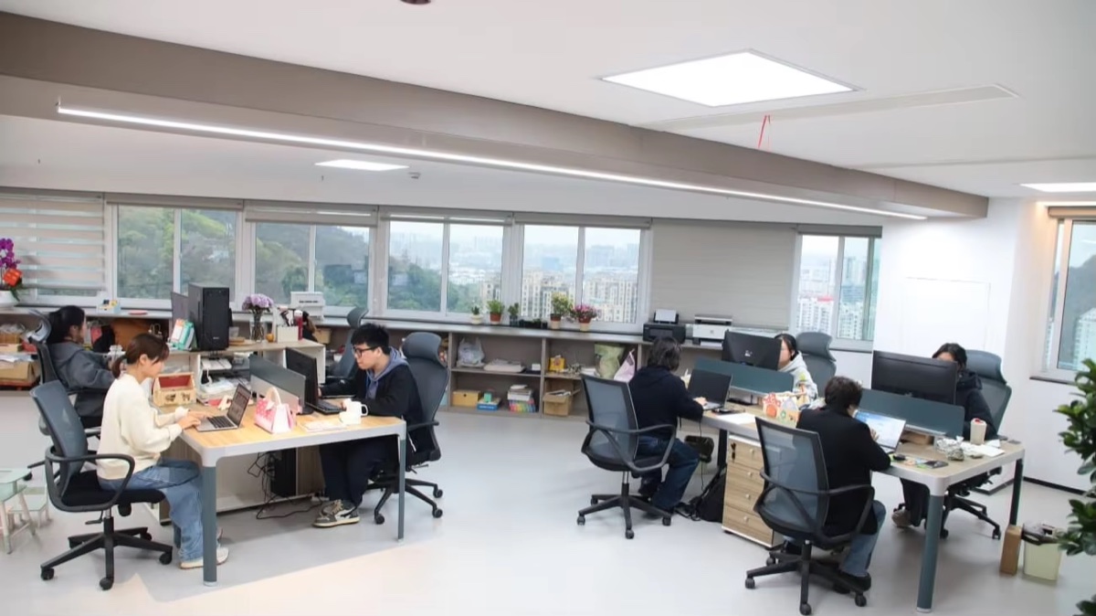 Sourcing team working together in the office